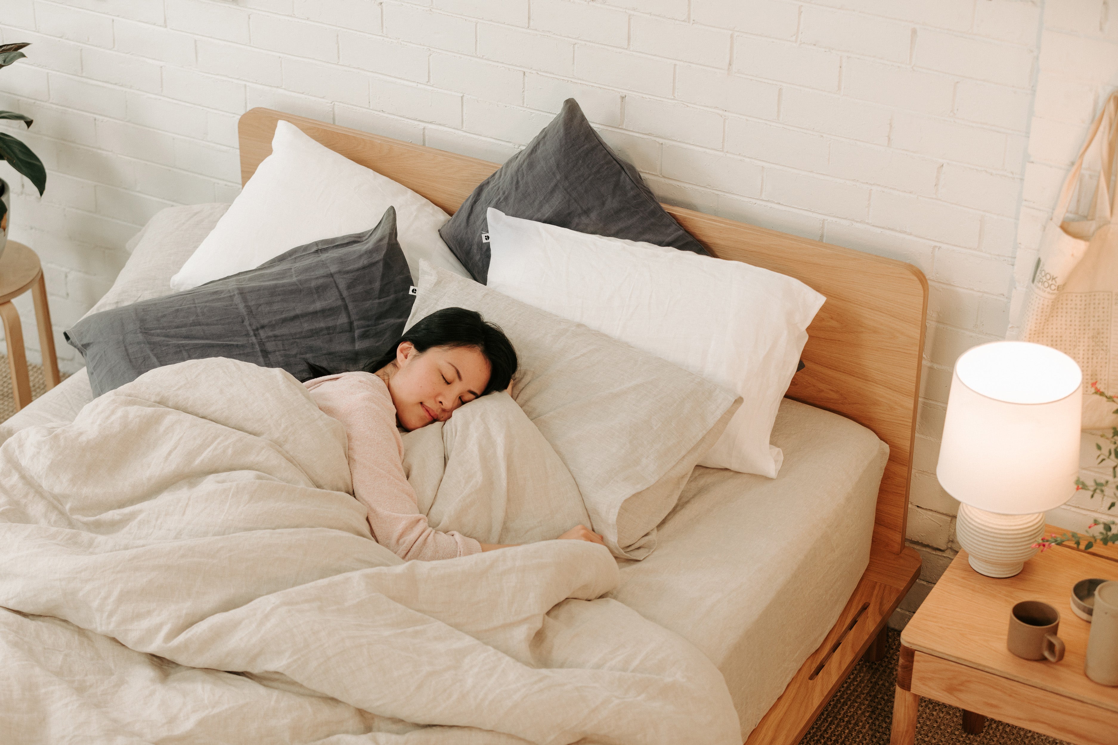 Person sleeping in comfortable bed 
