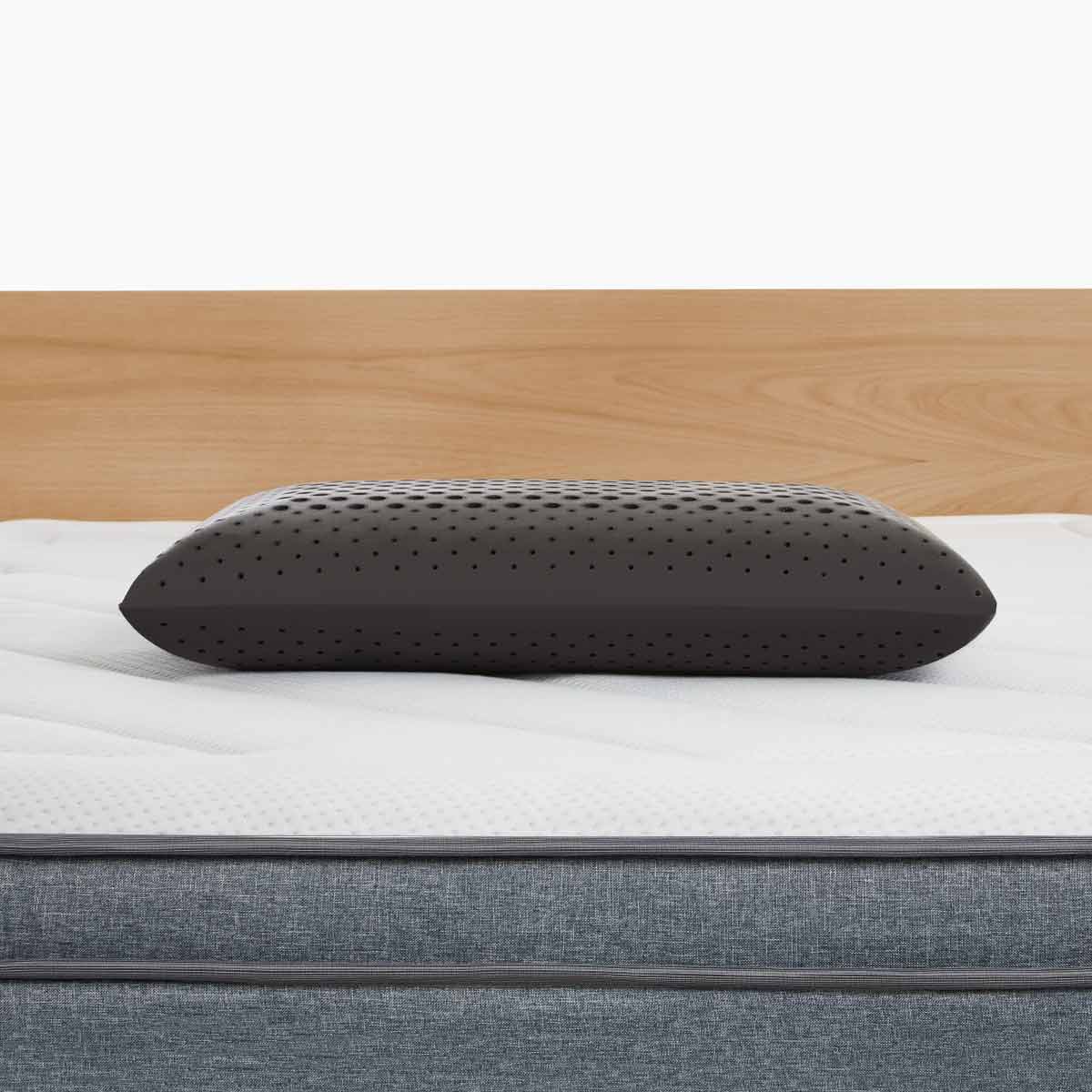 Eva Pillow in Charcoal without Cover on the Eva Mattress
